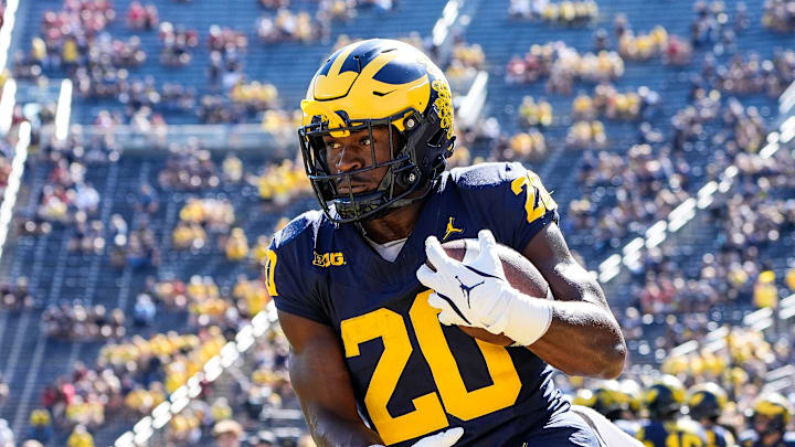 Michigan running back Kalel Mullings (20) warms up before the USC game at Michigan Stadium in Ann Arbor on Saturday, Sept. 21, 2024.