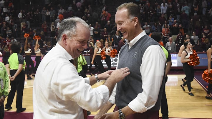 Jan 11, 2020; Blacksburg, Virginia, USA; Virginia Tech Hokies head coach Mike Young reacts with athletic director Whit Babcock following the victory against the NC State Wolfpack at Cassell Coliseum. Mandatory Credit: Michael Thomas Shroyer-Imagn Images Jan 11, 2020; Blacksburg, Virginia, USA; Virginia Tech Hokies head coach Mike Young reacts with athletic director Whit Babcock following the victory against the NC State Wolfpack at Cassell Coliseum. Mandatory Credit: Michael Thomas Shroyer-Imagn Images