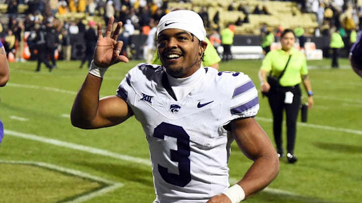 Oct 12, 2024; Boulder, Colorado, USA; Kansas State Wildcats running back Dylan Edwards (3) celebrates as he leaves the field after a win against the Colorado Buffaloes at Folsom Field. Mandatory Credit: Christopher Hanewinckel-Imagn Images Oct 12, 2024; Boulder, Colorado, USA; Kansas State Wildcats running back Dylan Edwards (3) celebrates as he leaves the field after a win against the Colorado Buffaloes at Folsom Field. Mandatory Credit: Christopher Hanewinckel-Imagn Images