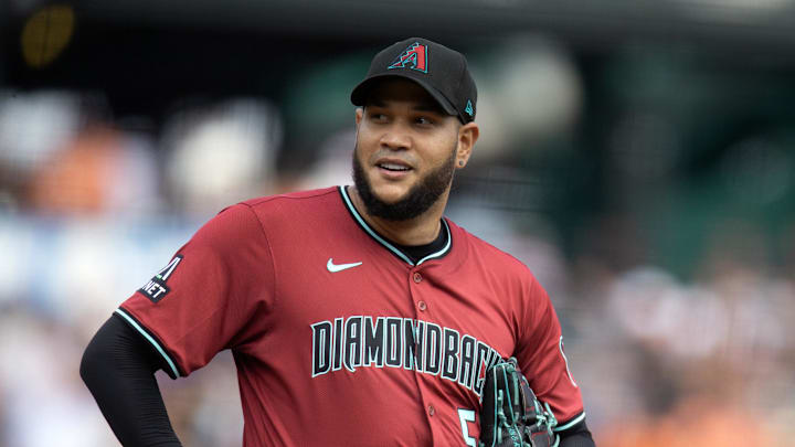 Sep 10, 2025; San Francisco, California, USA; Arizona Diamondbacks pitcher starting Eduardo Rodriguez (57) waits while manager Torey Lovullo comes to remove him for a reliever during the seventh inning against the San Francisco Giants at Oracle Park. Mandatory Credit: D. Ross Cameron-Imagn Images