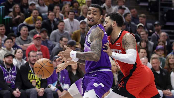 Mar 29, 2024; Salt Lake City, Utah, USA;  Houston Rockets guard Fred VanVleet (5) knocks the ball away from Utah Jazz forward John Collins (20) during the first quarter at Delta Center. Mandatory Credit: Chris Nicoll-USA TODAY Sports