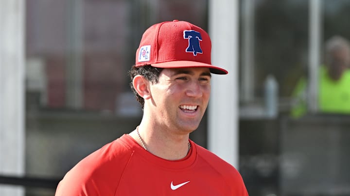 Feb 12, 2025; Clearwater, FL, USA; Philadelphia Phillies pitcher Andrew Painter (76) walks onto the field before the start of a spring training workout at Carpenter Complex 