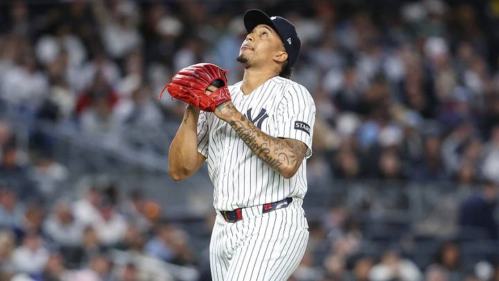 New York Yankees relief pitcher Yovanny Cruz (96) reacts after getting taken out of the game in the sixth inning against the Toronto Blue Jays at Yankee Stadium. New York Yankees relief pitcher Yovanny Cruz (96) reacts after getting taken out of the game in the sixth inning against the Toronto Blue Jays at Yankee Stadium.