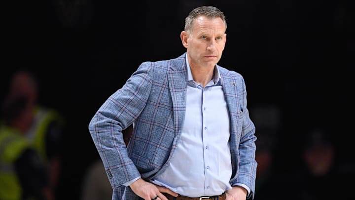 Jan 7, 2026; Nashville, Tennessee, USA;  Alabama Crimson Tide head coach Nate Oats watches his team against the Vanderbilt Commodores during the first half at Memorial Gymnasium. Mandatory Credit: Steve Roberts-Imagn Images