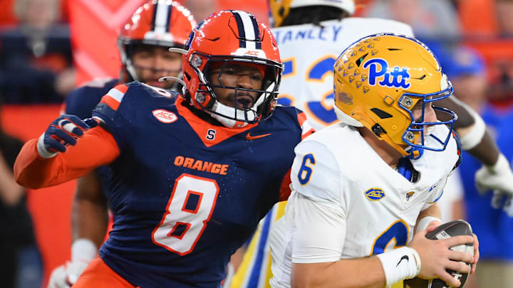 Oct 18, 2025; Syracuse, New York, USA; Syracuse Orange linebacker David Reese (8) pressures Pittsburgh Panthers quarterback Mason Heintschel (6) during the first half at the JMA Wireless Dome. Mandatory Credit: Rich Barnes-Imagn Images Oct 18, 2025; Syracuse, New York, USA; Syracuse Orange linebacker David Reese (8) pressures Pittsburgh Panthers quarterback Mason Heintschel (6) during the first half at the JMA Wireless Dome. Mandatory Credit: Rich Barnes-Imagn Images