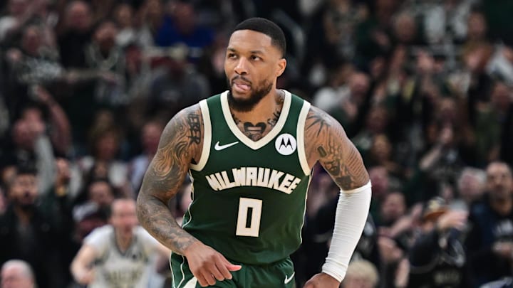 Apr 21, 2024; Milwaukee, Wisconsin, USA; Milwaukee Bucks guard Damian Lillard (0) reacts after hitting a shot against the Pacers. 