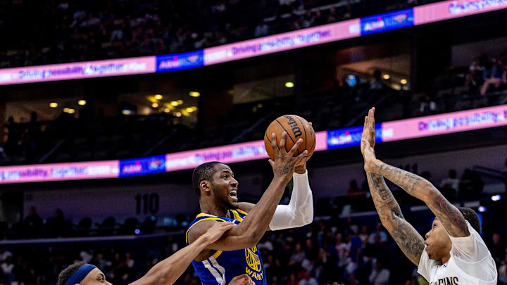 Mar 28, 2025; New Orleans, Louisiana, USA; Golden State Warriors forward Jonathan Kuminga (00) drives to the basket against New Orleans Pelicans guard Jordan Hawkins (24) during the second half at Smoothie King Center. Mandatory Credit: Stephen Lew-Imagn Images Mar 28, 2025; New Orleans, Louisiana, USA; Golden State Warriors forward Jonathan Kuminga (00) drives to the basket against New Orleans Pelicans guard Jordan Hawkins (24) during the second half at Smoothie King Center. Mandatory Credit: Stephen Lew-Imagn Images