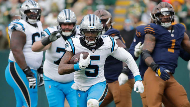 Carolina Panthers running back Rico Dowdle (5) breaks away for a long gain with less than a minute left in the game against the Green Bay Packers during their football game Sunday, November 2, 2025, at Lambeau Field in Green Bay, Wisconsin. Carolina won 16-13.
