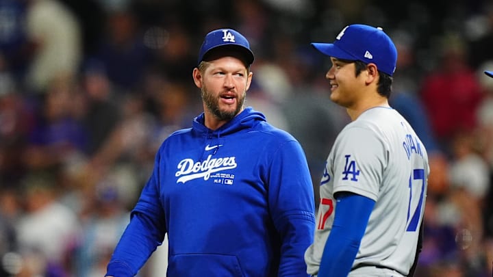 Dodgers pitcher Clayton Kershaw (22) and designated hitter Shohei Ohtani (17) celebrate defeating the Colorado Rockies at Coors Field on Sept. 28, 2024. Dodgers pitcher Clayton Kershaw (22) and designated hitter Shohei Ohtani (17) celebrate defeating the Colorado Rockies at Coors Field on Sept. 28, 2024.