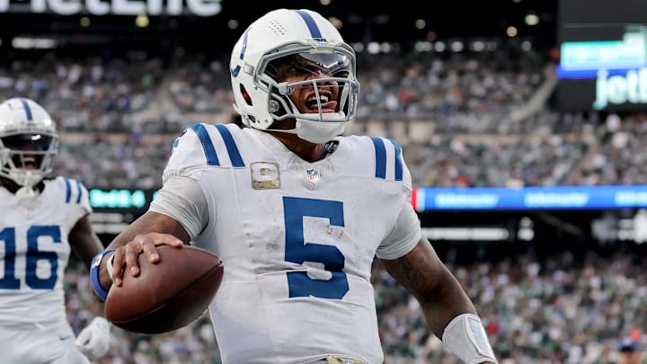 Nov 17, 2024; East Rutherford, New Jersey, USA; Indianapolis Colts quarterback Anthony Richardson (5) celebrates his touchdown against the New York Jets during the fourth quarter at MetLife Stadium. Mandatory Credit: Brad Penner-Imagn Images