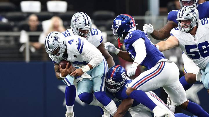 New York Giants linebacker Brian Burns (0) tackles Dallas Cowboys quarterback Dak Prescott (4) during the second quarter at AT&T Stadium. Mandatory Credit: Kevin Jairaj-Imagn Images New York Giants linebacker Brian Burns (0) tackles Dallas Cowboys quarterback Dak Prescott (4) during the second quarter at AT&T Stadium. Mandatory Credit: Kevin Jairaj-Imagn Images