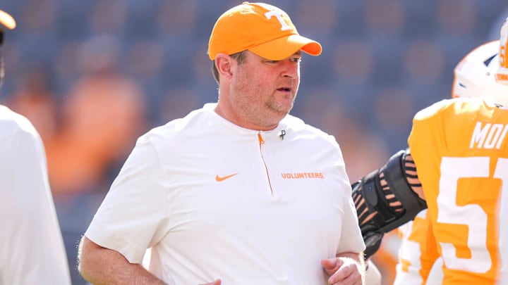 Tennessee coach Josh Heupel jogs during warm-ups before a college football game between Tennessee and Arkansas at Neyland Stadium in Knoxville, Tenn., on Oct. 11, 2025. Tennessee coach Josh Heupel jogs during warm-ups before a college football game between Tennessee and Arkansas at Neyland Stadium in Knoxville, Tenn., on Oct. 11, 2025.