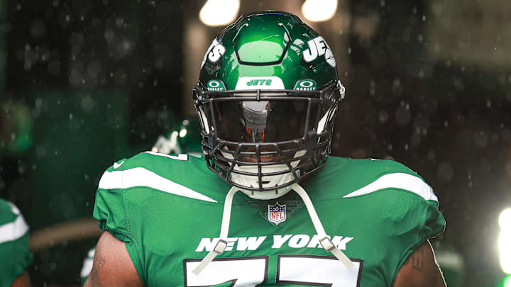 Dec 10, 2023; East Rutherford, New Jersey, USA; New York Jets offensive tackle Mekhi Becton (77)