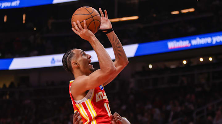 Oct 22, 2025; Atlanta, Georgia, USA; Atlanta Hawks forward Zaccharie Risacher (10) shoots against the Toronto Raptors in the second quarter at State Farm Arena. Mandatory Credit: Brett Davis-Imagn Images