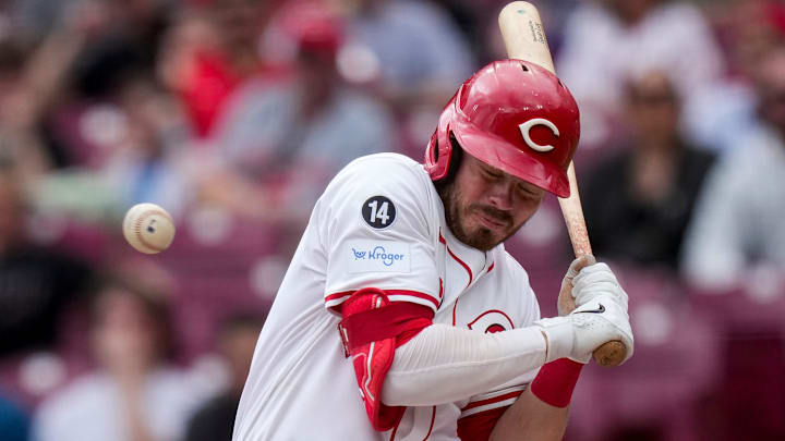 Cincinnati Reds second base Gavin Lux (2) pulls back from a high-inside pitch in the seventh inning of the MLB Interleague game between the Cincinnati Reds and the Texas Rangers at Great American Ball Park in downtown Cincinnati on Wednesday, April 2, 2025. The Rangers won 1-0.