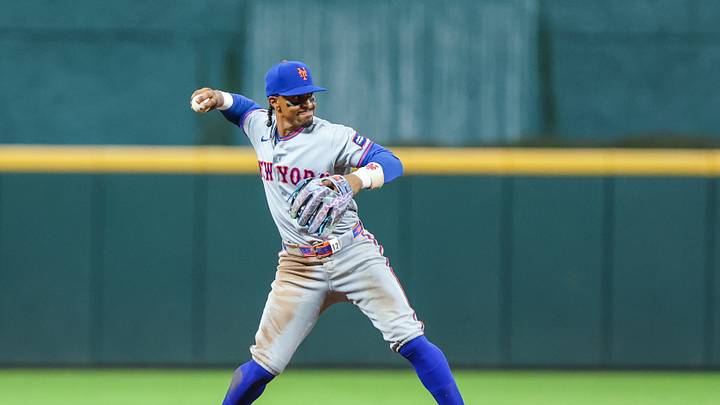 Aug 10, 2026; Cumberland, Georgia, USA; New York Mets shortstop Francisco Lindor (12) throws the ball to first base for an out against the Atlanta Braves during the seventh inning at Truist Park. Mandatory Credit: Jordan Godfree-Imagn Images
