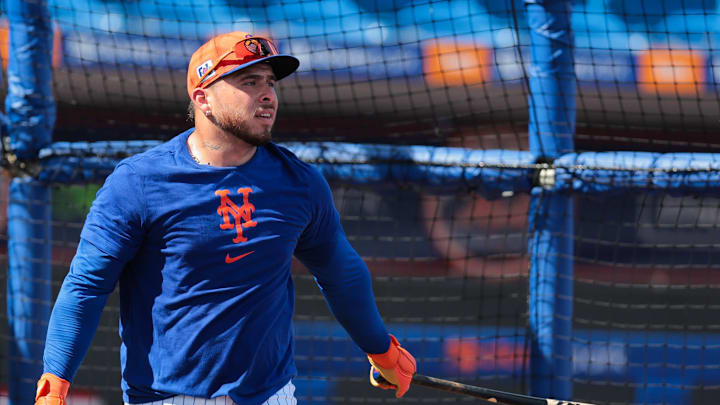 Feb 12, 2025; Port St. Lucie, FL, USA; New York Mets catcher Francisco Alvarez (4) looks on after taking batting practice during a Spring Training workout at Clover Park. Mandatory Credit: Sam Navarro-Imagn Images Feb 12, 2025; Port St. Lucie, FL, USA; New York Mets catcher Francisco Alvarez (4) looks on after taking batting practice during a Spring Training workout at Clover Park. Mandatory Credit: Sam Navarro-Imagn Images