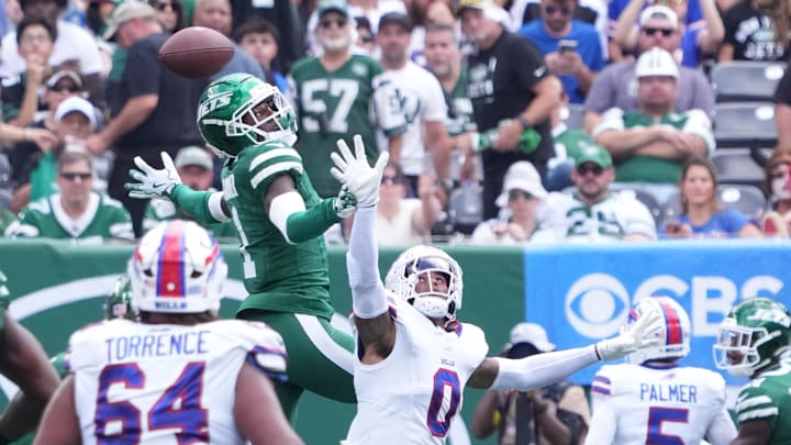 Sep 14, 2025; East Rutherford, New Jersey, USA; New York Jets cornerback Sauce Gardner (1) defends the pass on Buffalo Bills wide receiver Keon Coleman (0) during the first half at MetLife Stadium. Mandatory Credit: Robert Deutsch-Imagn Images