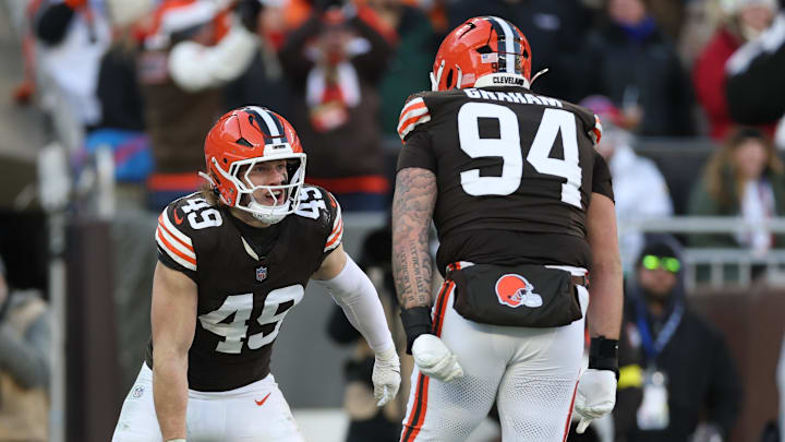 Dec 21, 2025; Cleveland, Ohio, USA;  Cleveland Browns linebacker Carson Schwesinger (49) reacts with defensive tackle Mason Graham (94) after a sack against the Buffalo Bills during the second half at Huntington Bank Field. Mandatory Credit: Scott Galvin-Imagn Images