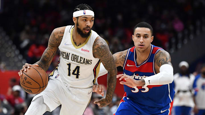 Nov 15, 2021; Washington, District of Columbia, USA; New Orleans Pelicans forward Brandon Ingram (14) dribbles as Washington Wizards forward Kyle Kuzma (33) chases during the second half at Capital One Arena. Mandatory Credit: Brad Mills-Imagn Images Nov 15, 2021; Washington, District of Columbia, USA; New Orleans Pelicans forward Brandon Ingram (14) dribbles as Washington Wizards forward Kyle Kuzma (33) chases during the second half at Capital One Arena. Mandatory Credit: Brad Mills-Imagn Images