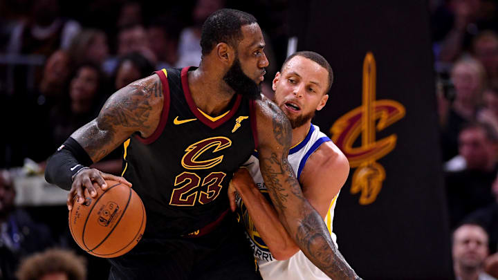 Jun 8, 2018; Cleveland, OH, USA; Cleveland Cavaliers forward LeBron James (23) handles the ball against Golden State Warriors guard Stephen Curry (30) during the second quarter in game four of the 2018 NBA Finals at Quicken Loans Arena. Mandatory Credit: Kyle Terada-Imagn Images Jun 8, 2018; Cleveland, OH, USA; Cleveland Cavaliers forward LeBron James (23) handles the ball against Golden State Warriors guard Stephen Curry (30) during the second quarter in game four of the 2018 NBA Finals at Quicken Loans Arena. Mandatory Credit: Kyle Terada-Imagn Images