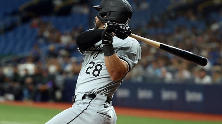 May 8, 2024; St. Petersburg, Florida, USA; Chicago White Sox outfielder Tommy Pham (28) hits a RBI single against the Tampa Bay Rays during the sixth inning at Tropicana Field. Mandatory Credit: Kim Klement Neitzel-USA TODAY Sports