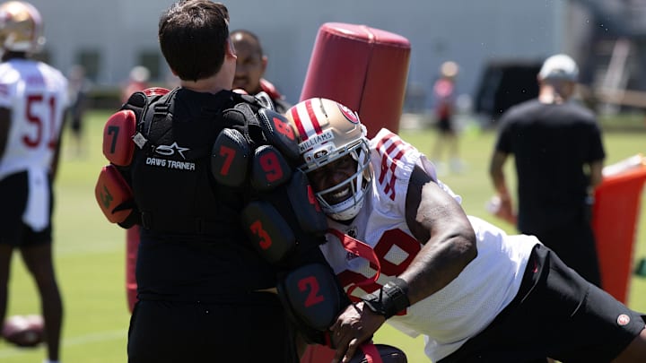 May 9, 2025; Santa Clara, CA, USA; San Francisco 49ers defensive lineman Mikel Williams (98) bats at a ball as part of a rushing drill during the teamís rookie minicamp. Mandatory Credit: D. Ross Cameron-Imagn Images