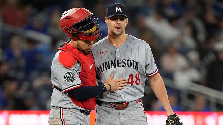 Apr 12, 2026; Toronto, Ontario, CAN; Minnesota Twins catcher Victor Caratini (37) and Minnesota Twins pitcher Justin Topa (48) celebrate a win over the Toronto Blue Jays at Rogers Centre. Mandatory Credit: John E. Sokolowski-Imagn Images Apr 12, 2026; Toronto, Ontario, CAN; Minnesota Twins catcher Victor Caratini (37) and Minnesota Twins pitcher Justin Topa (48) celebrate a win over the Toronto Blue Jays at Rogers Centre. Mandatory Credit: John E. Sokolowski-Imagn Images
