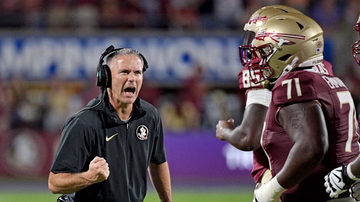 Sep 3, 2023; Orlando, Florida, USA; Florida State Seminoles head coach Mike Norvell is excited during the fourth quarter against the Louisiana State Tigers at Camping World Stadium. Mandatory Credit: Melina Myers-Imagn Images