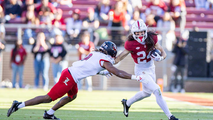 Nov 16, 2024; Stanford, California, USA; Stanford Cardinal wide receiver Tiger Bachmeier (24) turns the corner during the second quarter against the Louisville Cardinals at Stanford Stadium. Mandatory Credit: Bob Kupbens-Imagn Images Nov 16, 2024; Stanford, California, USA; Stanford Cardinal wide receiver Tiger Bachmeier (24) turns the corner during the second quarter against the Louisville Cardinals at Stanford Stadium. Mandatory Credit: Bob Kupbens-Imagn Images