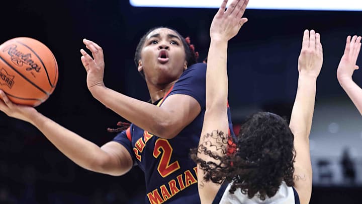 Purcell Marian's Dee Alexander (2) looks to cap her record-breaking career with her fourth state title.