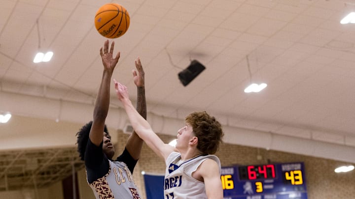Andress’ Justin Williams (5) shoots the ball during a District 1-5A boys basketball game against Burges on Tuesday, Feb. 3, 2026, at Burges High School in El Paso, Texas.