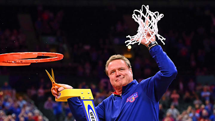 Apr 4, 2022; New Orleans, LA, USA; Kansas Jayhawks head coach Bill Self reacts after cutting down the net after their win against the North Carolina Tar Heels in the 2022 NCAA men's basketball tournament Final Four championship game at Caesars Superdome. Mandatory Credit: Bob Donnan-Imagn Images Apr 4, 2022; New Orleans, LA, USA; Kansas Jayhawks head coach Bill Self reacts after cutting down the net after their win against the North Carolina Tar Heels in the 2022 NCAA men's basketball tournament Final Four championship game at Caesars Superdome. Mandatory Credit: Bob Donnan-Imagn Images