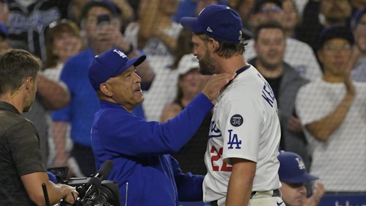 Jul 2, 2025; Los Angeles, California, USA;  Los Angeles Dodgers starting pitcher Clayton Kershaw (22) is congratulated by Los Angeles Dodgers manager Dave Roberts (30) after his 3000th career strike of Chicago White Sox third baseman Vinny Capra (41) in the fifth inning at Dodger Stadium. Mandatory Credit: Jayne Kamin-Oncea-Imagn Images