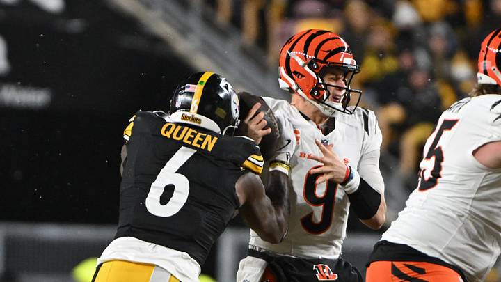 Jan 4, 2025; Pittsburgh, Pennsylvania, USA; Pittsburgh Steelers linebacker Patrick Queen (6) forces a fumble by Cincinnati Bengals quarterback Joe Burrow (9) during the first quarter at Acrisure Stadium. Mandatory Credit: Barry Reeger-Imagn Images