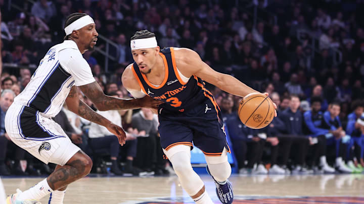 Jan 6, 2025; New York, New York, USA;  New York Knicks guard Josh Hart (3) looks to drive past Orlando Magic guard Kentavious Caldwell-Pope (3) in the first quarter at Madison Square Garden. Mandatory Credit: Wendell Cruz-Imagn Images