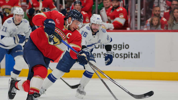 Mar 3, 2025; Sunrise, Florida, USA; Florida Panthers center Aleksander Barkov (16) scores against the Tampa Bay Lightning during the second period at Amerant Bank Arena. Mandatory Credit: Sam Navarro-Imagn Images