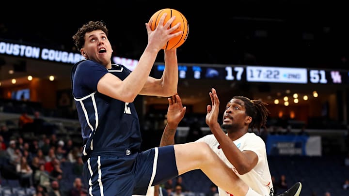 Mar 22, 2024; Memphis, TN, USA;  Longwood Lancers center Szymon Zapala (12) grabs a rebound against