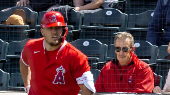 Mar 16, 2021; Tempe, Arizona, USA; Los Angeles Angels owner Arte Moreno (right) and outfielder Mike Trout against the Cleveland Indians during a Spring Training game at Tempe Diablo Stadium. Mandatory Credit: Mark J. Rebilas-USA TODAY Sports