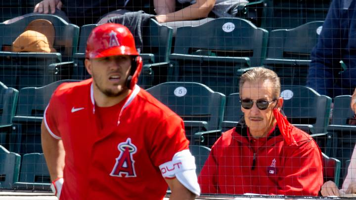 Mar 16, 2021; Tempe, Arizona, USA; Los Angeles Angels owner Arte Moreno (right) and outfielder Mike Trout against the Cleveland Indians during a Spring Training game at Tempe Diablo Stadium. Mandatory Credit: Mark J. Rebilas-USA TODAY Sports Mar 16, 2021; Tempe, Arizona, USA; Los Angeles Angels owner Arte Moreno (right) and outfielder Mike Trout against the Cleveland Indians during a Spring Training game at Tempe Diablo Stadium. Mandatory Credit: Mark J. Rebilas-USA TODAY Sports