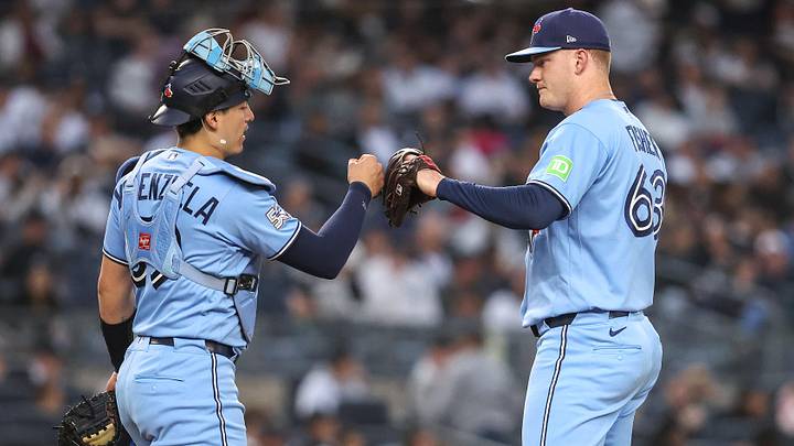 Toronto Blue Jays starting pitcher Braydon Fisher is greeted by catcher Brandon Valenzuela. Toronto Blue Jays starting pitcher Braydon Fisher is greeted by catcher Brandon Valenzuela.
