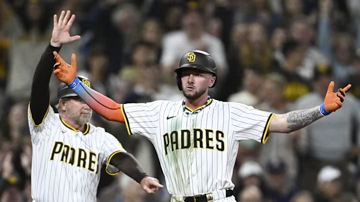 May 12, 2025; San Diego, California, USA; San Diego Padres center fielder Jackson Merrill (3) gestures after hitting a triple during the eighth inning against the Los Angeles Angels at Petco Park. Mandatory Credit: Denis Poroy-Imagn Images