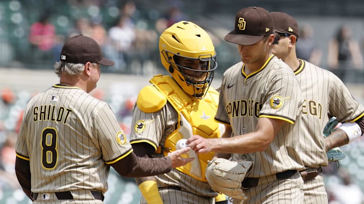 Apr 23, 2025; Detroit, Michigan, USA;  San Diego Padres manager Mike Shildt (8) take the ball to relieve starting pitcher Kyle Hart (68) in the fifth inning against the Detroit Tigers at Comerica Park. Mandatory Credit: Rick Osentoski-Imagn Images