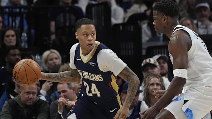Mar 21, 2025; Minneapolis, Minnesota, USA; New Orleans Pelicans guard Jordan Hawkins (24) works around Minnesota Timberwolves guard Anthony Edwards (5) in the first quarter at Target Center. Mandatory Credit: Bruce Kluckhohn-Imagn Images Mar 21, 2025; Minneapolis, Minnesota, USA; New Orleans Pelicans guard Jordan Hawkins (24) works around Minnesota Timberwolves guard Anthony Edwards (5) in the first quarter at Target Center. Mandatory Credit: Bruce Kluckhohn-Imagn Images