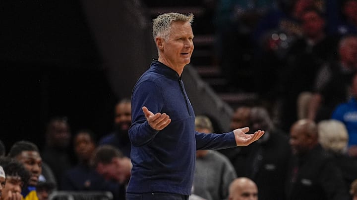 Mar 3, 2025; Charlotte, North Carolina, USA; Golden State Warriors head coach Steve Kerr reacts to a call during the second quarter against the Charlotte Hornets at Spectrum Center. Mandatory Credit: Jim Dedmon-Imagn Images