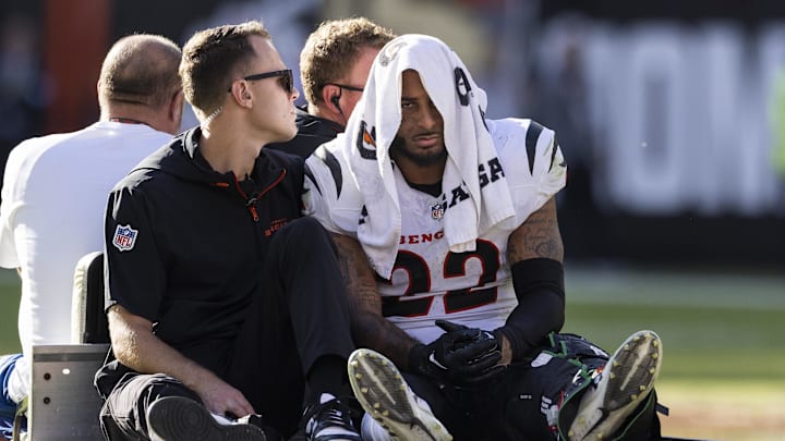 Oct 20, 2024; Cleveland, Ohio, USA; Cincinnati Bengals safety Geno Stone (22) rides the medical cart to the locker room following a leg injury during the fourth quarter against the Cleveland Browns at Huntington Bank Field. Mandatory Credit: Scott Galvin-Imagn Images