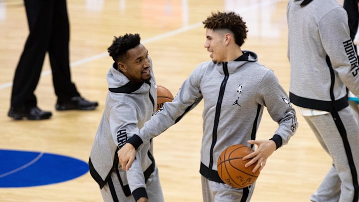 Jan 4, 2021; Philadelphia, Pennsylvania, USA; Charlotte Hornets guard LaMelo Ball (R) and guard Malik Monk (L) before action Philadelphia 76ers at Wells Fargo Center. Mandatory Credit: Bill Streicher-Imagn Images