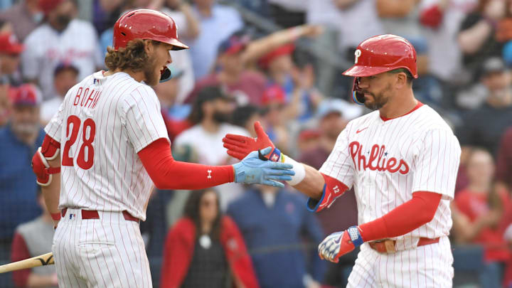 Mar 31, 2025; Philadelphia, Pennsylvania, USA; Philadelphia Phillies designated hitter Kyle Schwarber (12) celebrates his two-run home run with third base Alec Bohm (28) during the seventh inning against the Colorado Rockies at Citizens Bank Park. Mandatory Credit: Eric Hartline-Imagn Images Mar 31, 2025; Philadelphia, Pennsylvania, USA; Philadelphia Phillies designated hitter Kyle Schwarber (12) celebrates his two-run home run with third base Alec Bohm (28) during the seventh inning against the Colorado Rockies at Citizens Bank Park. Mandatory Credit: Eric Hartline-Imagn Images