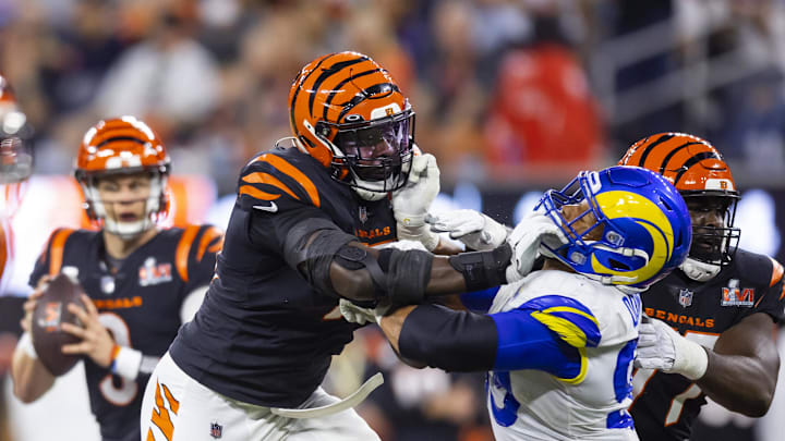 Feb 13, 2022; Inglewood, CA, USA; Cincinnati Bengals offensive tackle Isaiah Prince (75) blocks Los Angeles Rams defensive end Aaron Donald (99) during Super Bowl LVI at SoFi Stadium. Mandatory Credit: Mark J. Rebilas-Imagn Images Feb 13, 2022; Inglewood, CA, USA; Cincinnati Bengals offensive tackle Isaiah Prince (75) blocks Los Angeles Rams defensive end Aaron Donald (99) during Super Bowl LVI at SoFi Stadium. Mandatory Credit: Mark J. Rebilas-Imagn Images