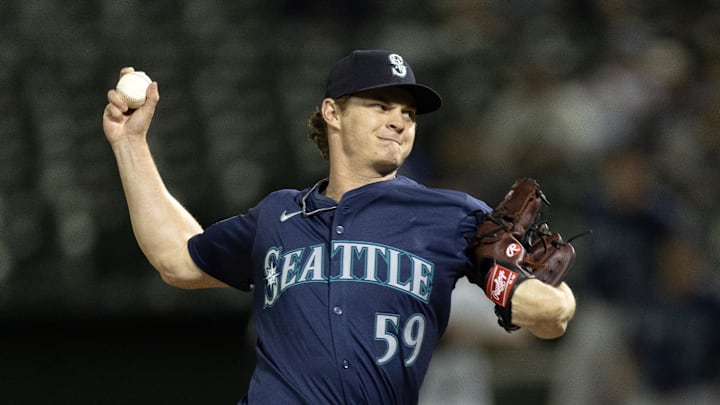 Seattle Mariners pitcher Troy Taylor (59) delivers a pitch against the Oakland Athletics during the eighth inning at Oakland-Alameda County Coliseum on Sept 3.